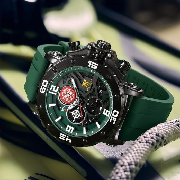 Green and black T5 watch with detailed face on a blurred background