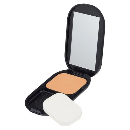 Compact powder with mirror and applicator on a white background