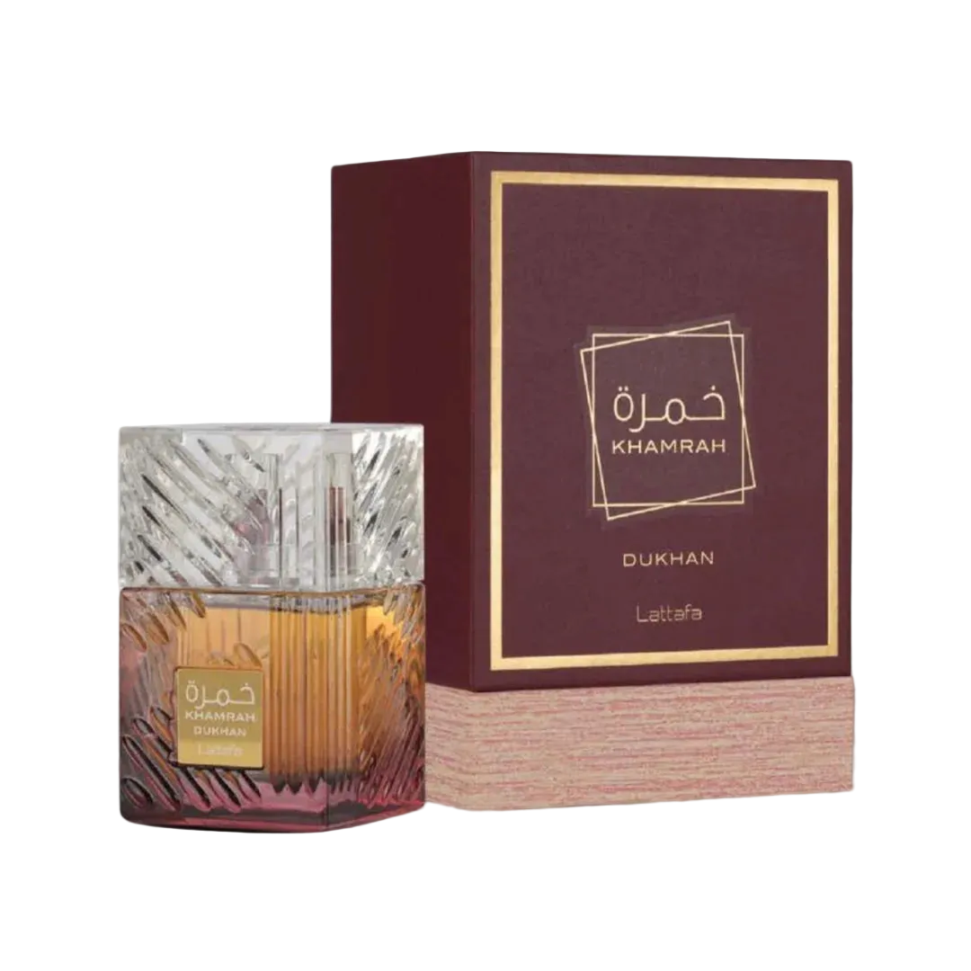 Perfume bottle and packaging with Lattafa 'Khamrah Dukhan' branding on a white background