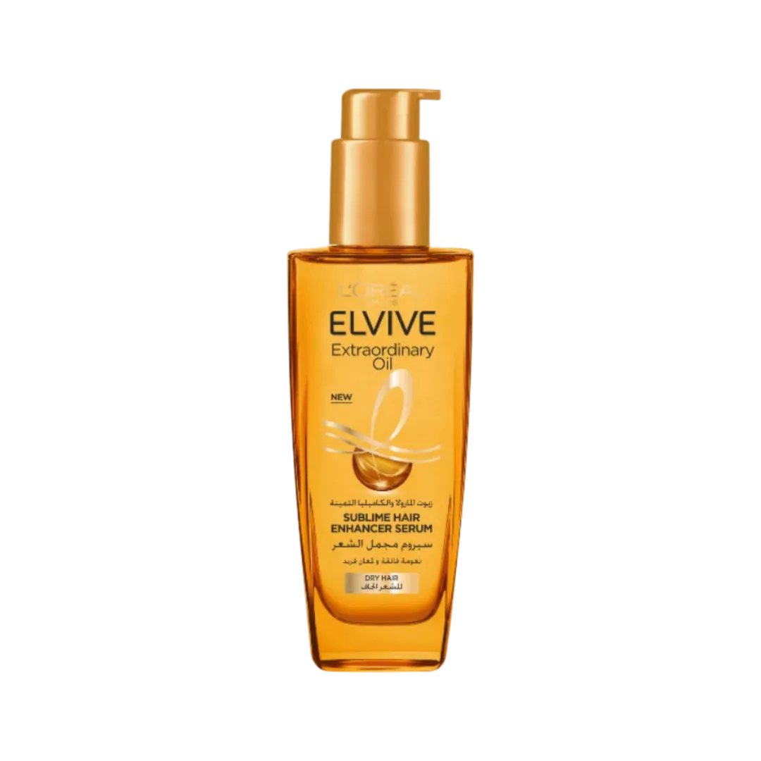 A bottle of L’Oréal Paris Elvive Extraordinary Hair Oil Treatment with a golden color liquid visible through the clear bottle.