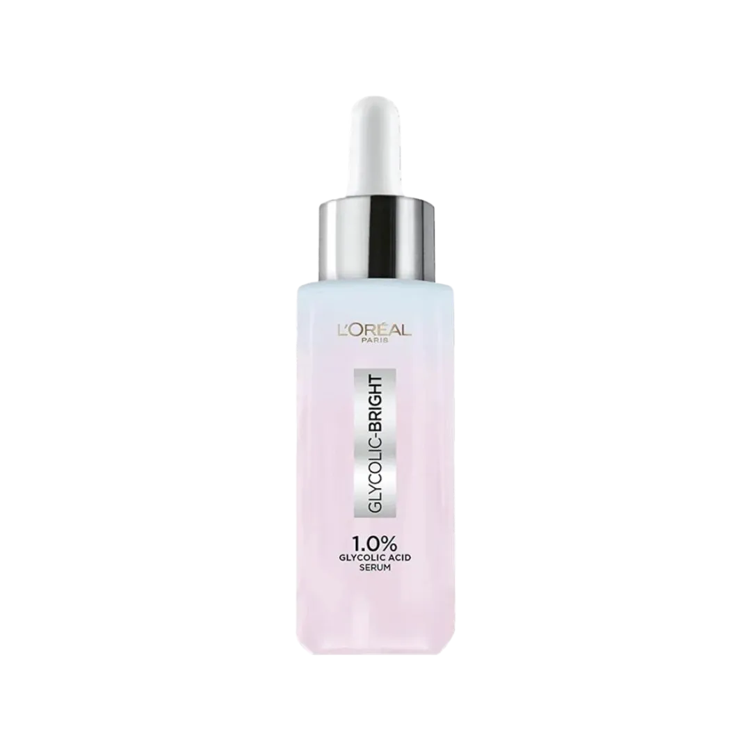 A bottle of L'Oréal Paris Glycolic Bright 1.0% Glycolic Acid Instant Glowing Face Serum with a dropper, labeled for brightening skin tone and reducing dark spots.