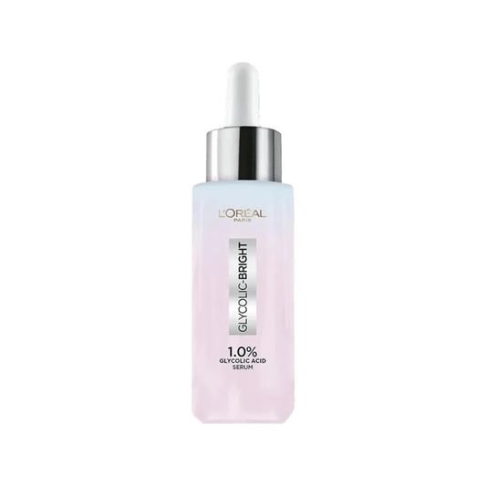 A bottle of L'Oréal Paris Glycolic Bright 1.0% Glycolic Acid Instant Glowing Face Serum with a dropper, labeled for brightening skin tone and reducing dark spots.