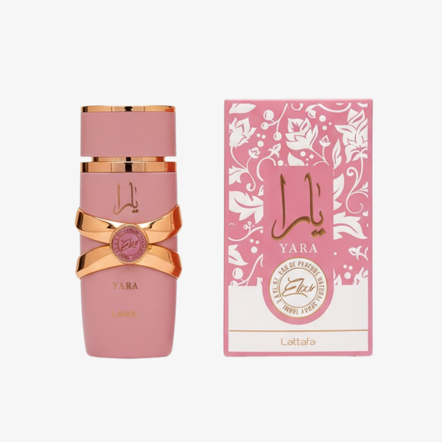 Pink perfume bottle branded Lattafa Yara Elixir with gold accents and matching box on a white background