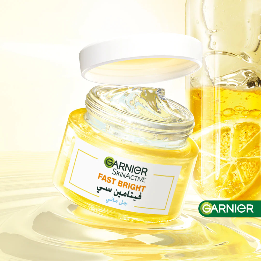 Garnier Fast Bright skincare product with a dropper bottle on a light yellow background