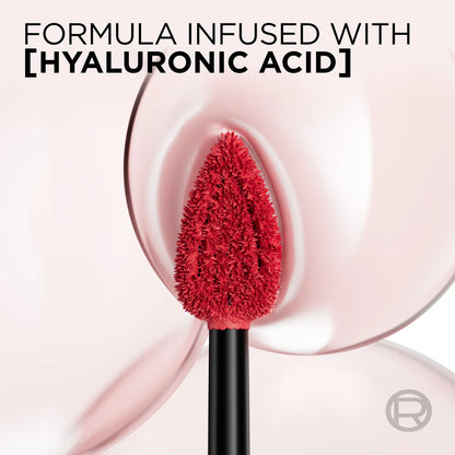 Red makeup brush with hyaluronic acid text on a pink background