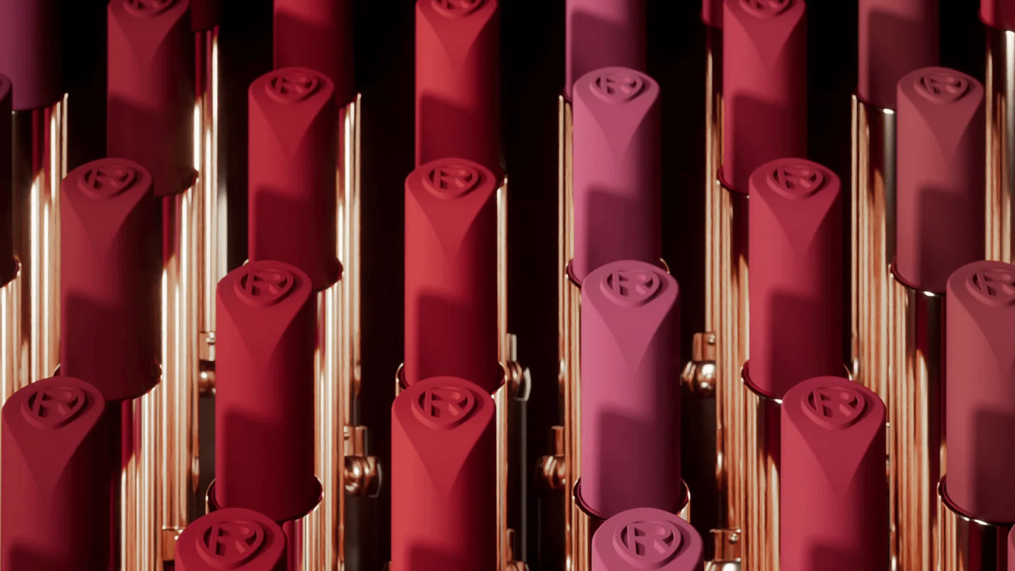 L'Oréal Paris Red lipsticks with rose designs on a black background