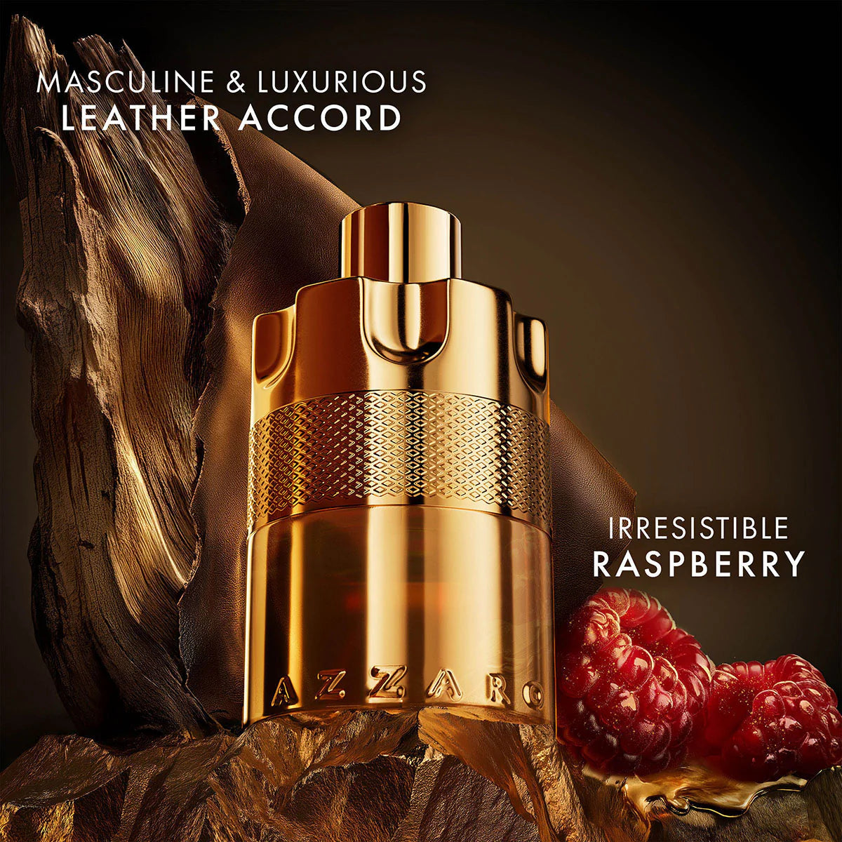 Gold perfume bottle with leather and raspberry elements on a dark background