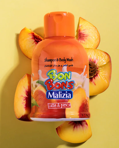 Bon Bons Malizia shampoo and body wash bottle surrounded by peach slices on a yellow background