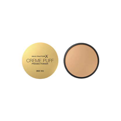 Max Factor Creme Puff pressed powder with yellow case and brown powder on a white background