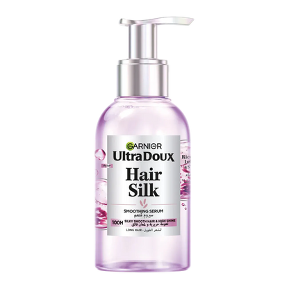 Garnier UltraDoux Hair Silk Smoothing Serum bottle on a white background