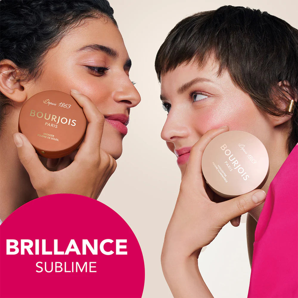 Two women applying Bourjois powder to their faces with a pink circle featuring 'Brillance Sublime' text.