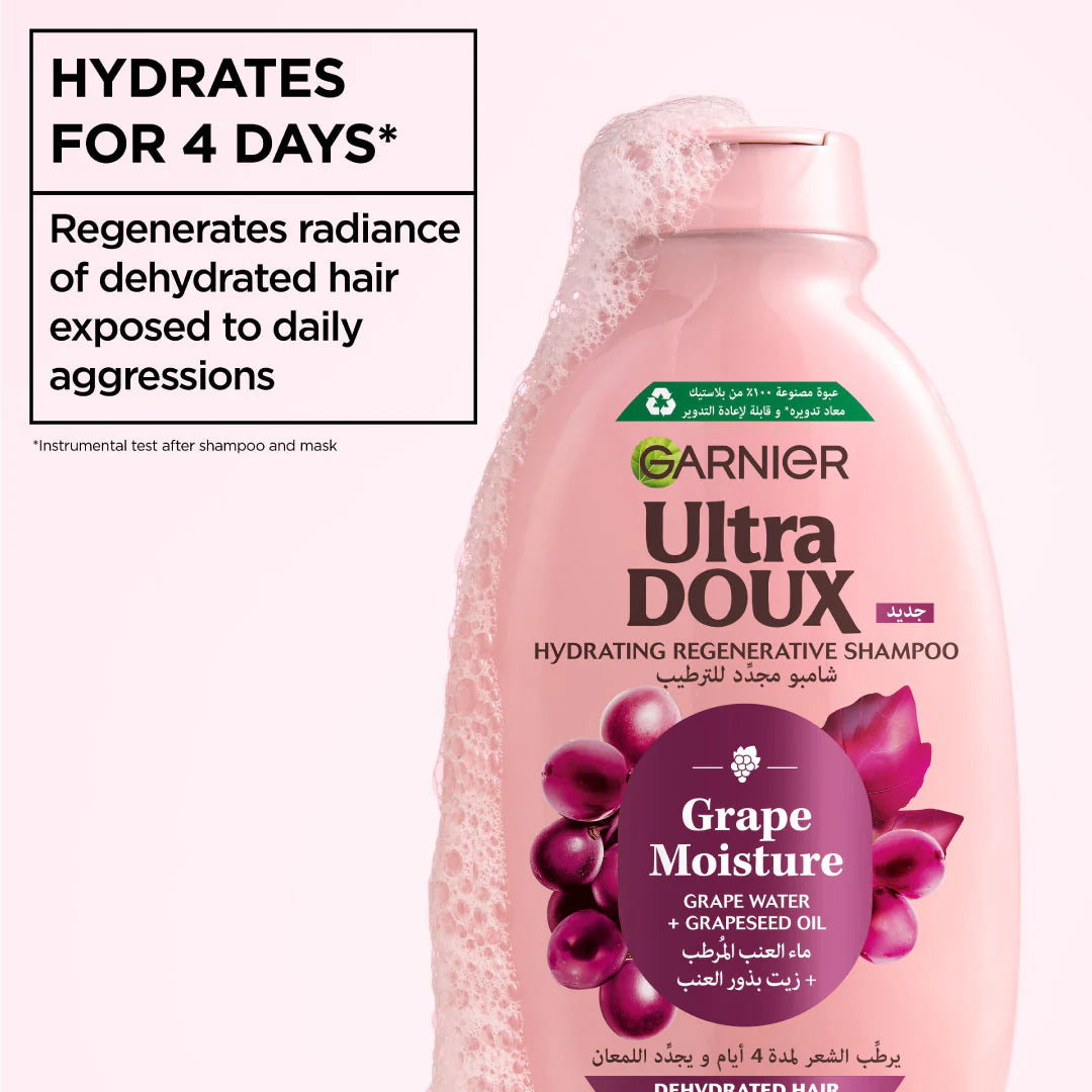 Garnier Ultra Doux Grape Moisture shampoo bottle on a white background