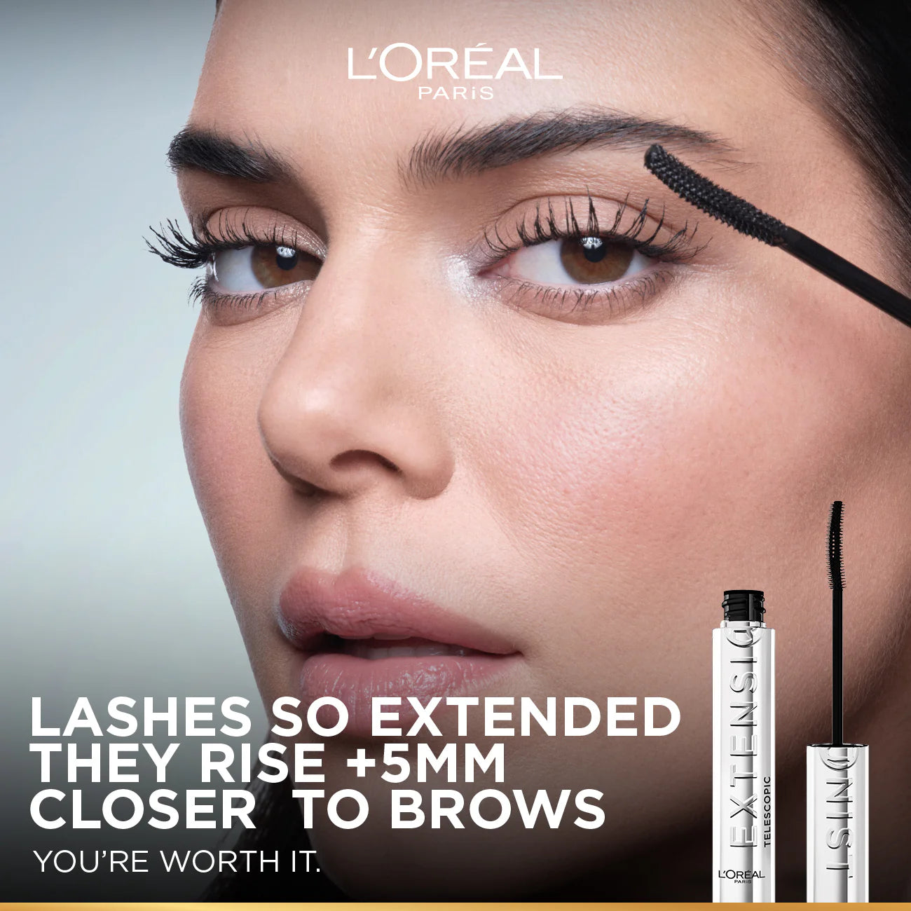 L'Oréal Paris Telescopic Extensionist Black Mascara advertisement with a close-up of a woman's eye and mascara wand.