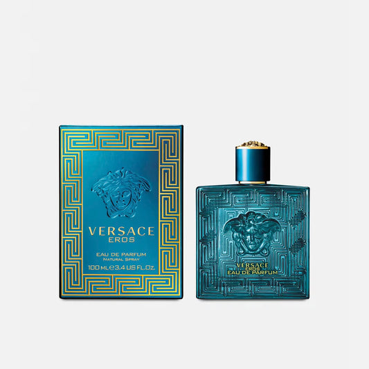 Versace Eros perfume bottle and packaging on a light gray background