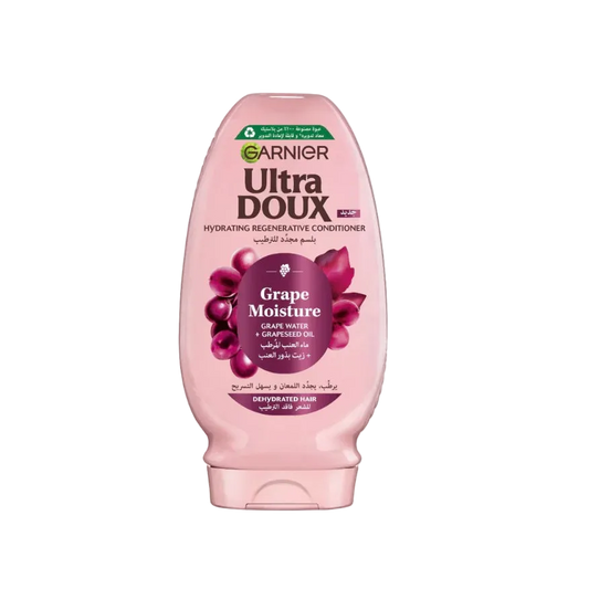 Garnier Ultra Doux Grape Moisture conditioner bottle on a white background