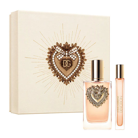 Dolce & Gabbana Devotion Two perfume bottles with decorative heart designs on a matching box against a white background