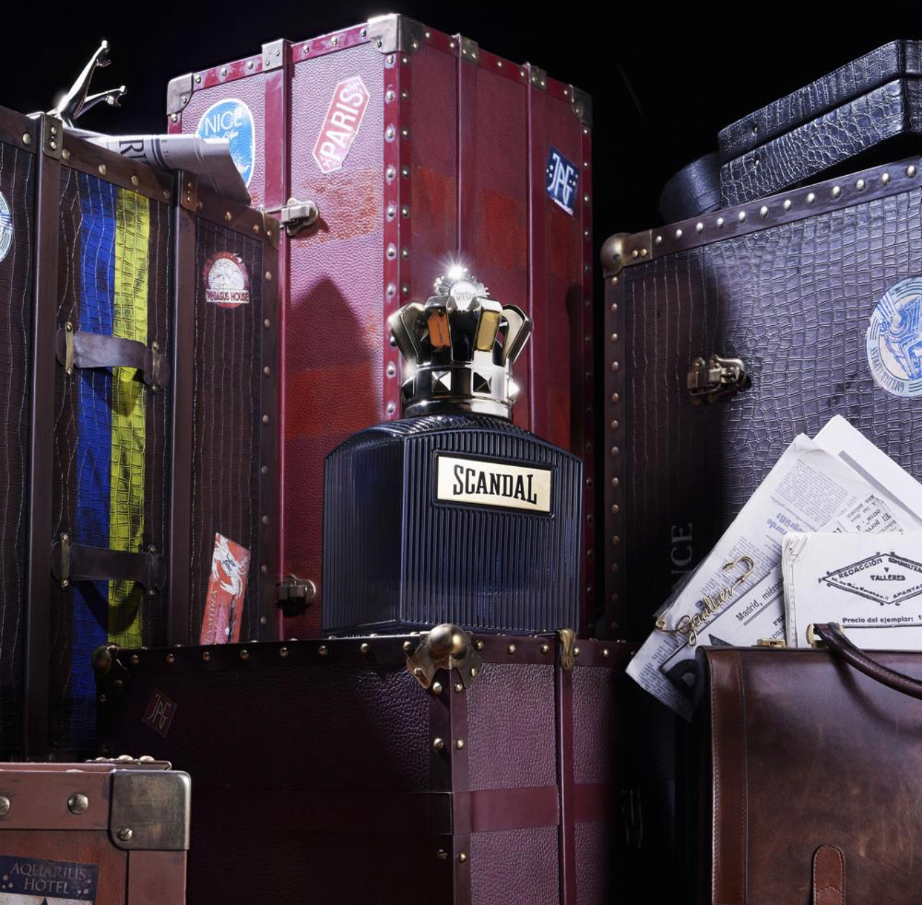 Scandal perfume bottle and packaging branded 'Jean Paul Gaultier' on a white background