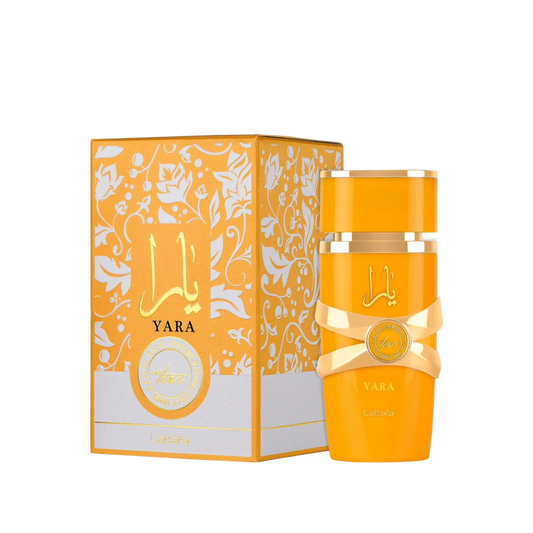Lattafa Yara Tous perfume bottle and packaging on a white background