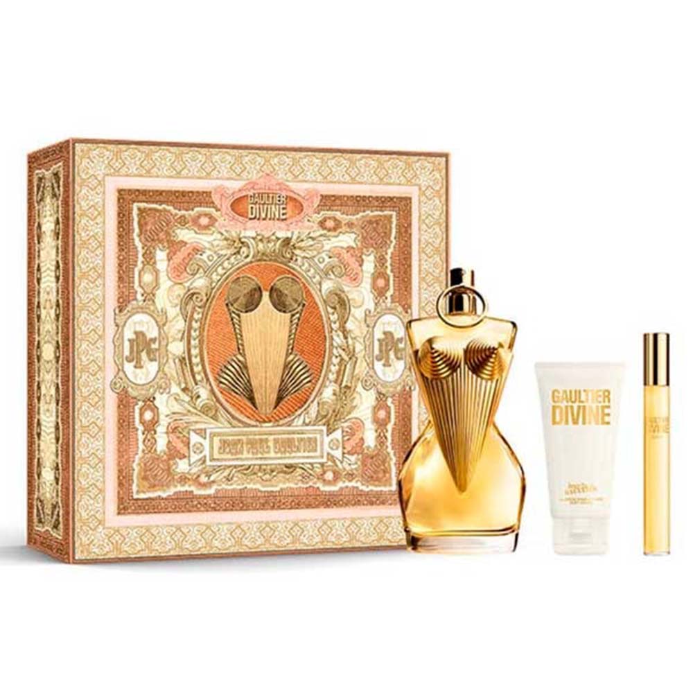 Gaultier Divine perfume set with packaging, bottle, and smaller items on a white background