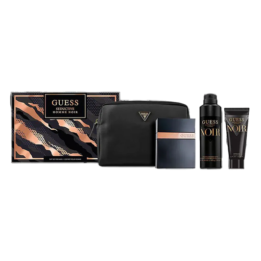 Guess Seductive Homme Noir gift set featuring a patterned box, a black toiletry bag, a dark blue and black perfume bottle, a black body spray bottle, and a black body wash tube on a white background.