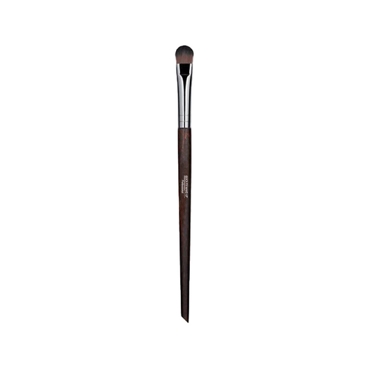 Makeup brush with brown handle and silver ferrule on a white background