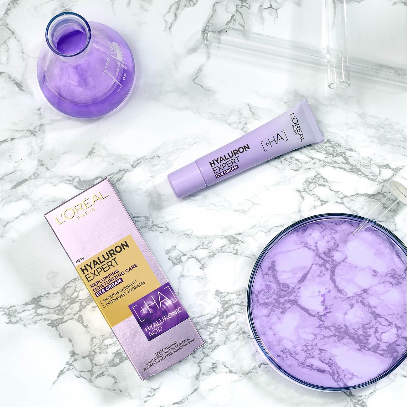 L'Oreal Hyaluron Expert skincare products on a marble surface