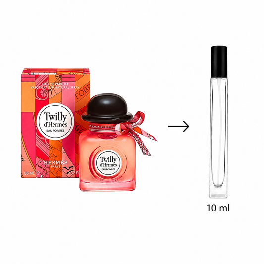 Twilly d'Hermès Eau Poivrée Eau de Parfum 10 ml travel atomizer spray bottle shown next to its colorful orange and pink packaging box, with an arrow indicating the bottle is made from the 10 ml atomizer.
