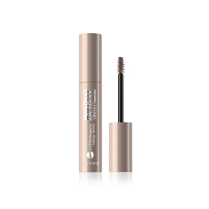 A tube of brow mascara with its cap off, showing the spoolie wand applicator. The packaging is a warm beige with black text, and the wand has a brown mascara visible at the tip, set against a clean white background.