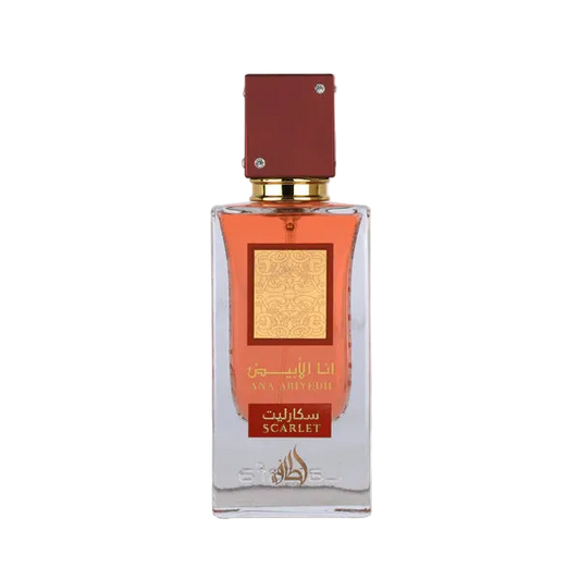 Perfume bottle Ana Abyedh Scarlet with red cap and clear body on a white background