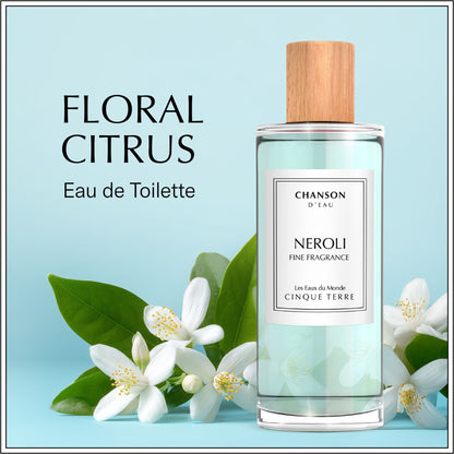 Chanson D'Eau Neroli Fine Fragrance Eau de Toilette bottle with a light wood cap, set against a light blue background with white neroli flowers and green leaves. Text on the left reads 'FLORAL CITRUS Eau de Toilette'.