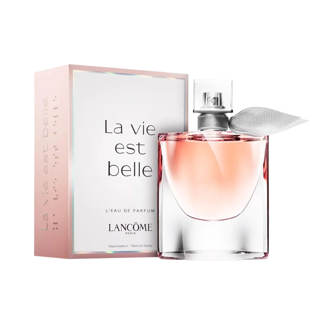 A bottle of Lancome La Vie Est Belle Eau De Parfum with its packaging box. The bottle is transparent with a pink liquid inside and the box has 'La vie est belle' written on it.