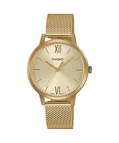 A Casio analog watch for women with a round gold-tone case, matching gold-tone mesh strap, and a light gold dial featuring black Roman numerals and gold hands.