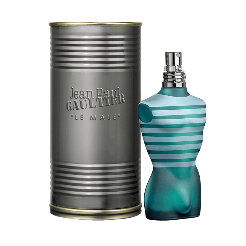 A cylindrical silver container with a lid, labeled 'Jean Paul Gaultier Le Male Eau de Toilette', alongside a blue and silver spray bottle.